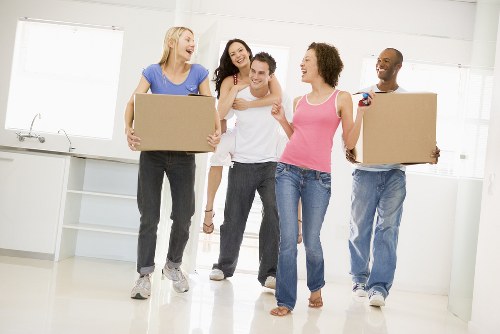 House removals planning in Barnet with moving boxes and checklist