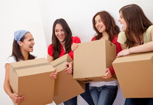 Mover handling furniture for a small removals service