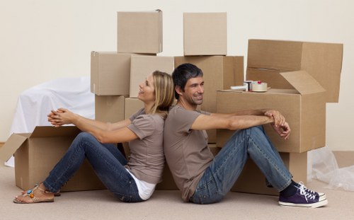 Final stage of house removals in Barnet with a moving team unloading