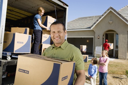 Packers organising boxes and furniture for local removals in Barnet